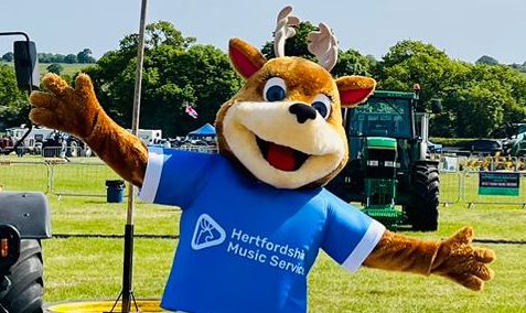 HMS mascot with her arms open in a welcoming stance
